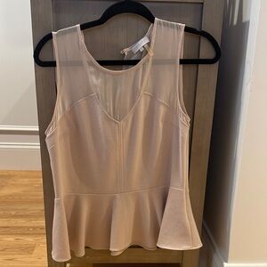 Elegant Sleeveless Peplum Top 1. State M